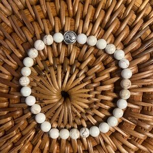 A handmade white howlite bracelet